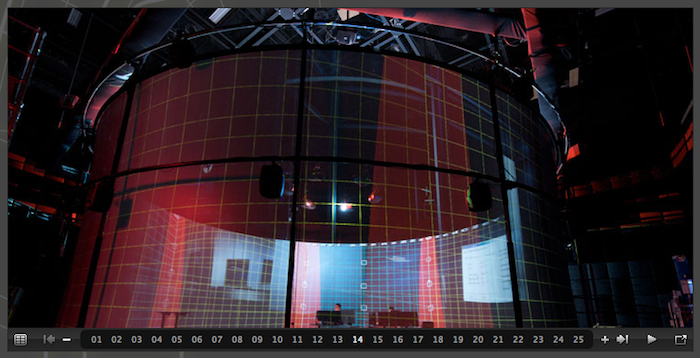 [The same panoramic screen during a performance in
                    studio 1 at RPI's EMPAC.]